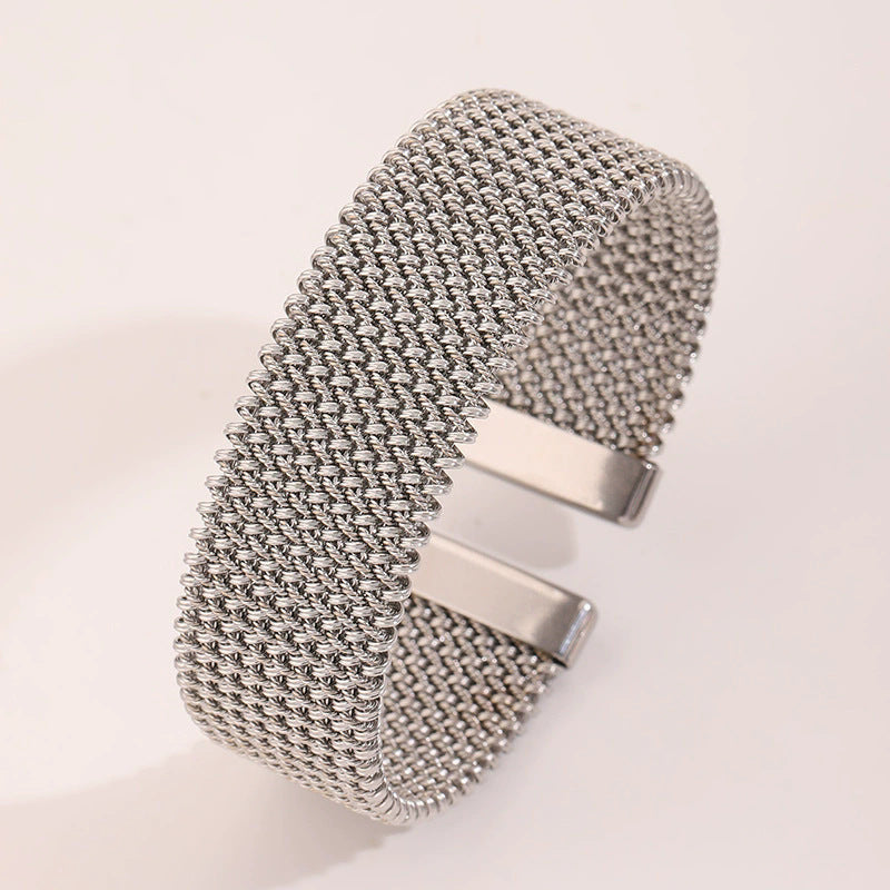 Ladies' textured embossed titanium steel bracelet, plated with 18K gold