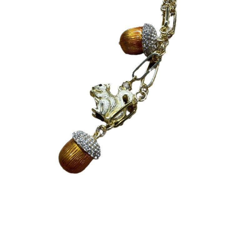 Vintage Rustic Squirrel Climbing Tree Orange Pinecone Necklace Animal Sweater Chain