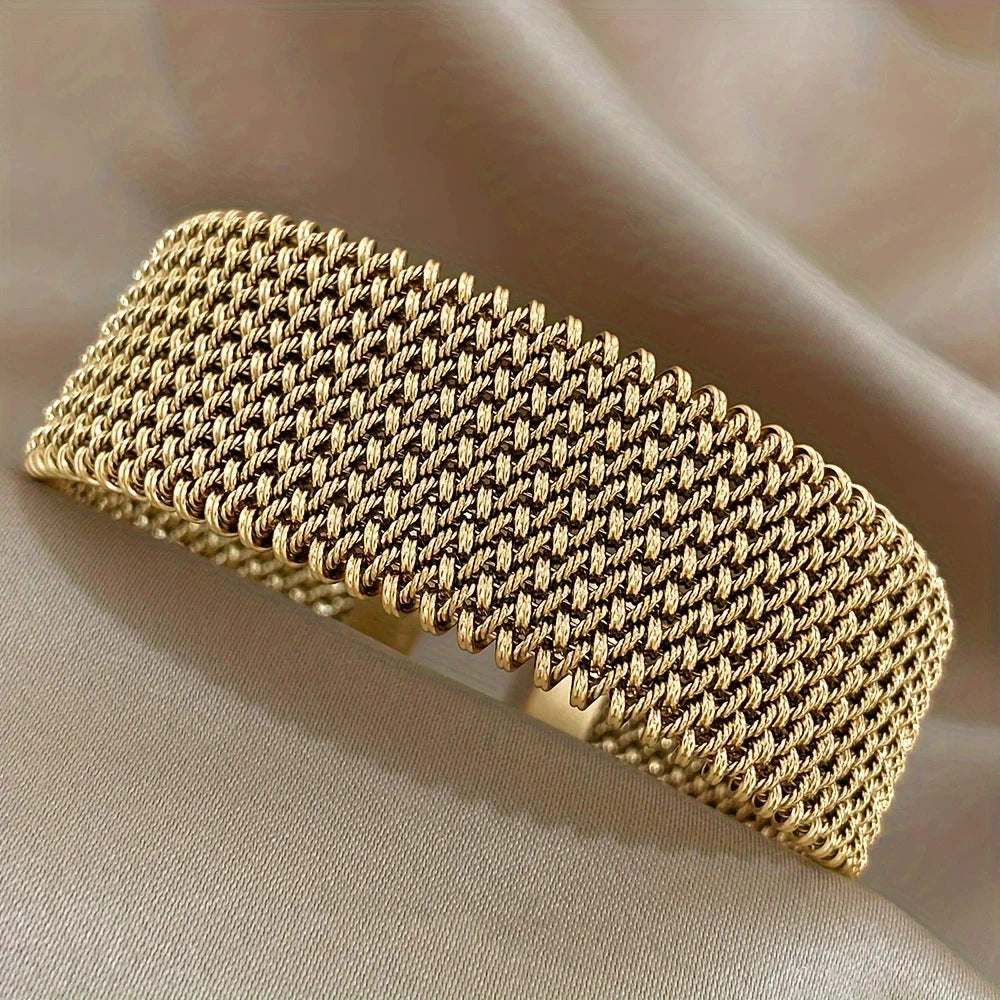 Ladies' textured embossed titanium steel bracelet, plated with 18K gold